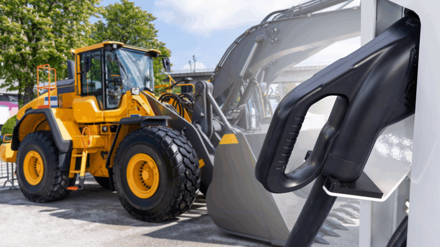 Yellow working machine with electric battery