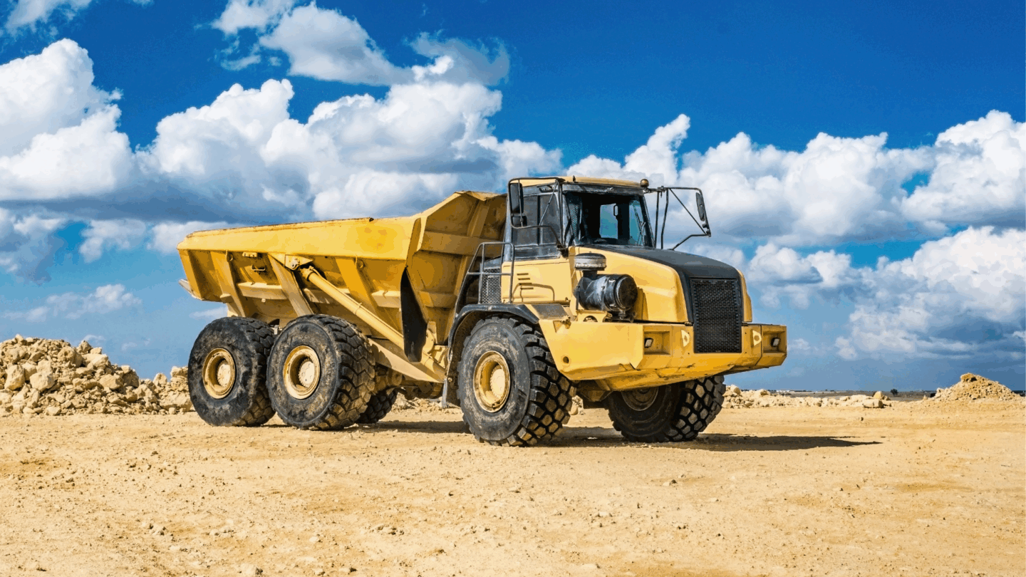 Yellow mobile machine in sunshine